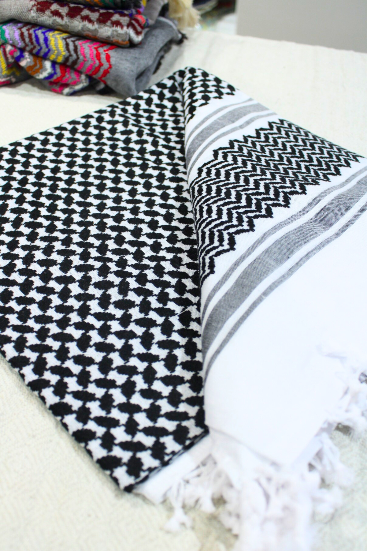 Dark black and white keffiyeh with tassels