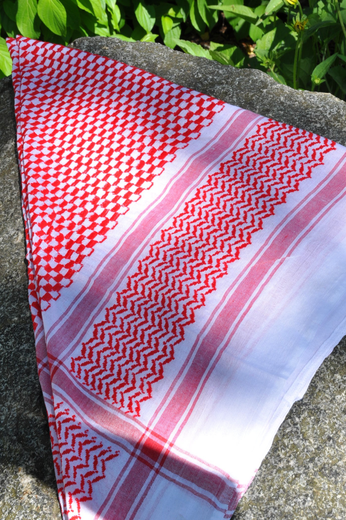 Handmade red and white Keffiyeh scarf without tassels, offering a timeless design that blends heritage with contemporary fashion. A versatile piece for any occasion.