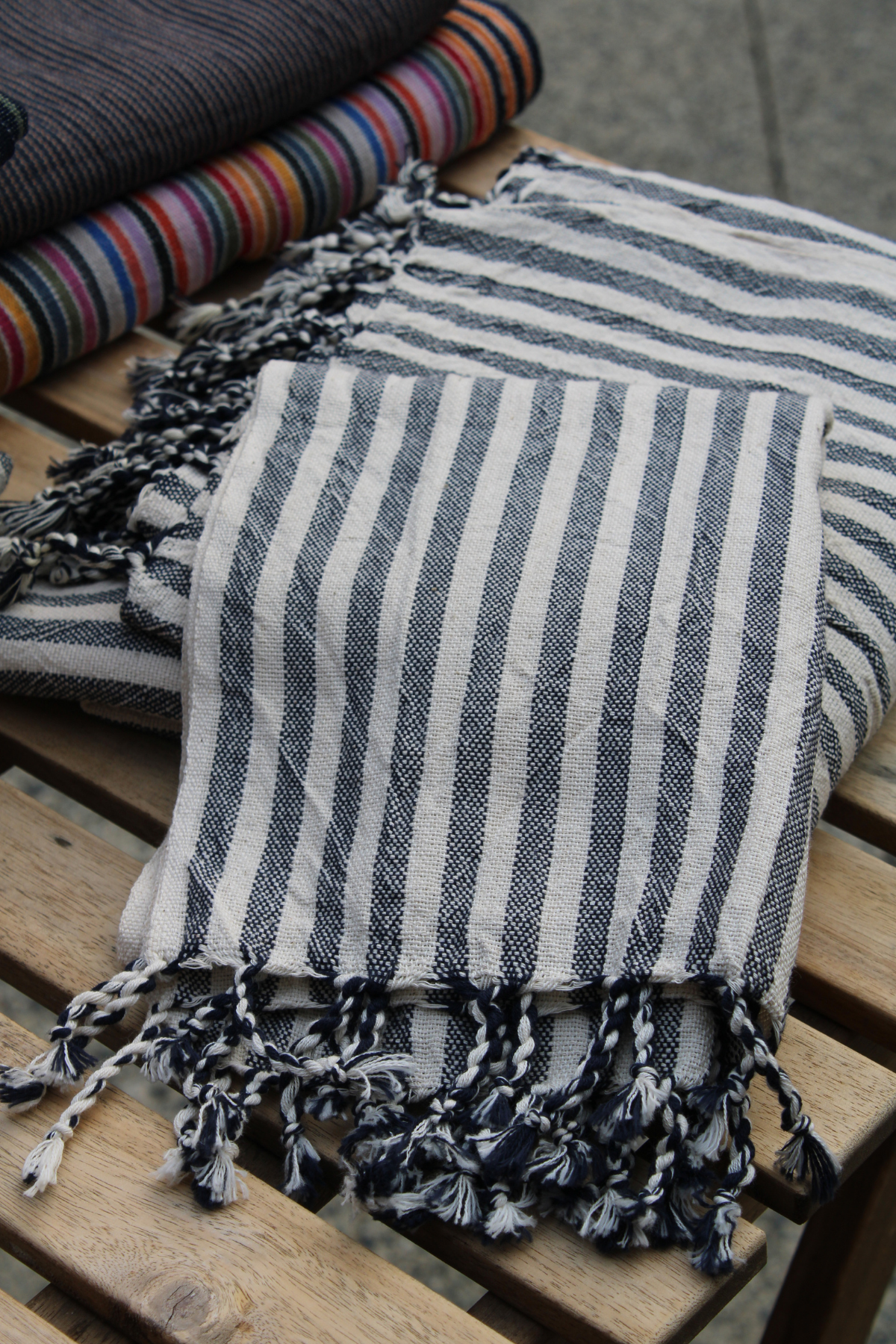 A detailed close-up of the black and white striped Turkish hand towel at Soumak Boutique, Kids Market, Vancouver, BC, Canada.