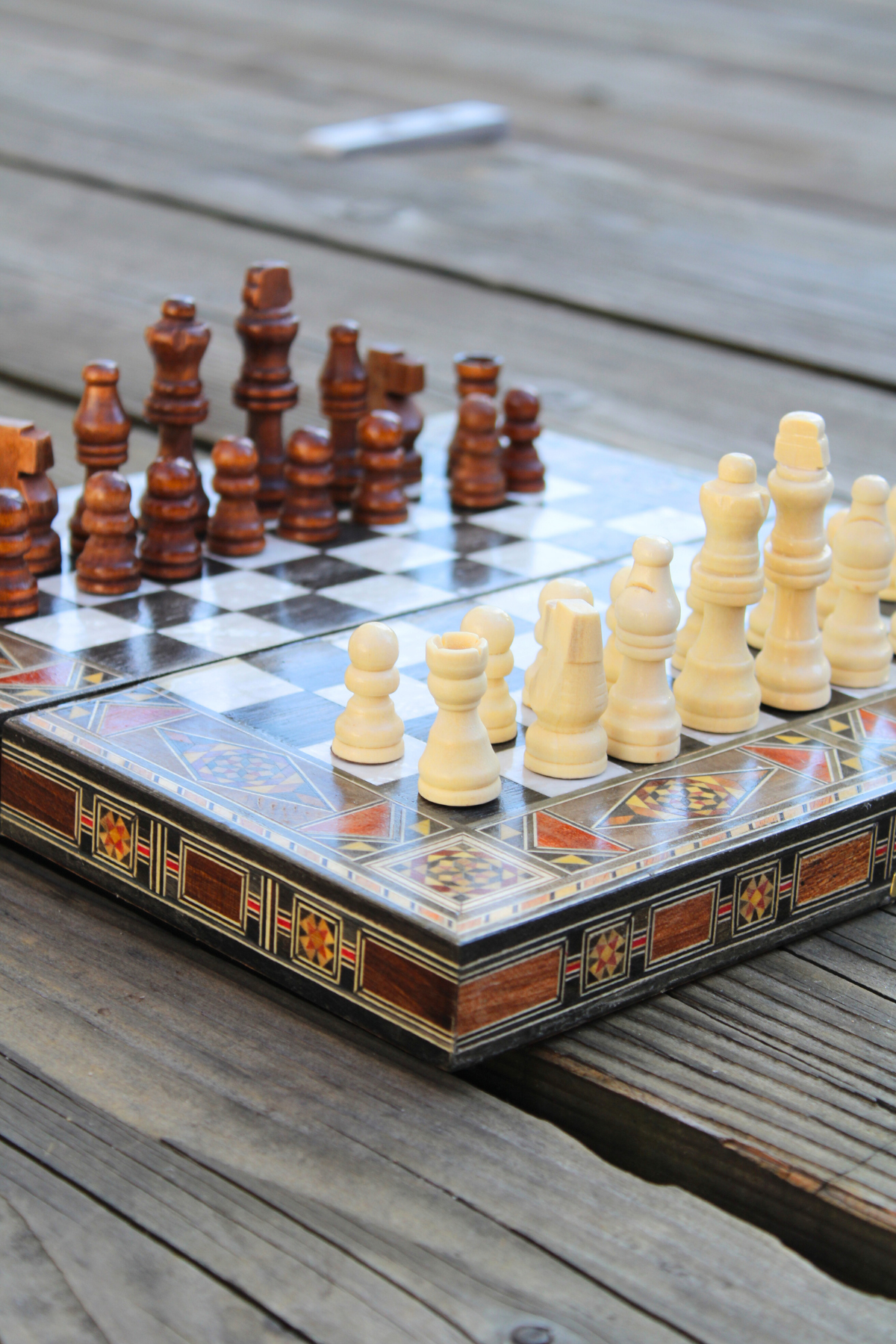 Close-up corner view of the Classic Elegance Chess and Backgammon Board, highlighting the sleek black and white square design. A perfect representation of timeless style, this board is ideal for both play and display.