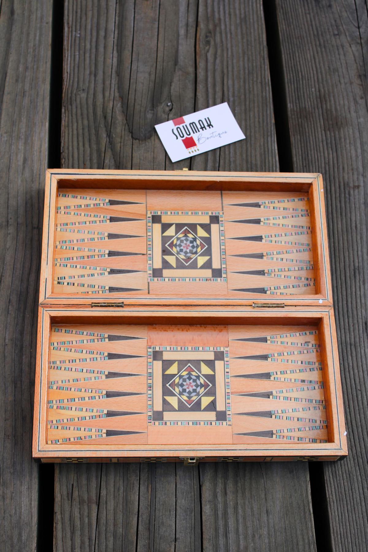 Exposed view of the backgammon side of the Sunlit Blossom Mosaic Chess and Backgammon Board, highlighting its intricate floral mosaic design. This beautiful presentation emphasizes the board's artistry and elegance, perfect for enhancing any gaming or decorative space.