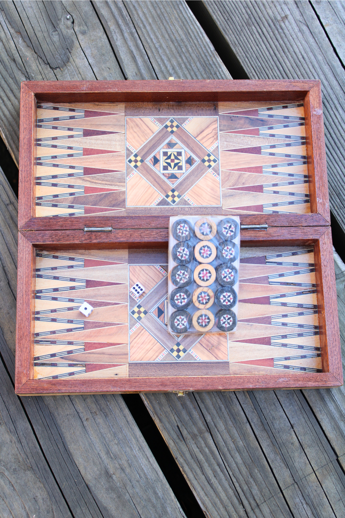 Detailed view of the backgammon side of the Woodland Mosaic Chess and Backgammon Board, featuring wooden backgammon pieces and dice. This beautifully designed board elevates the gaming experience, combining functionality with the elegance of handcrafted artistry.